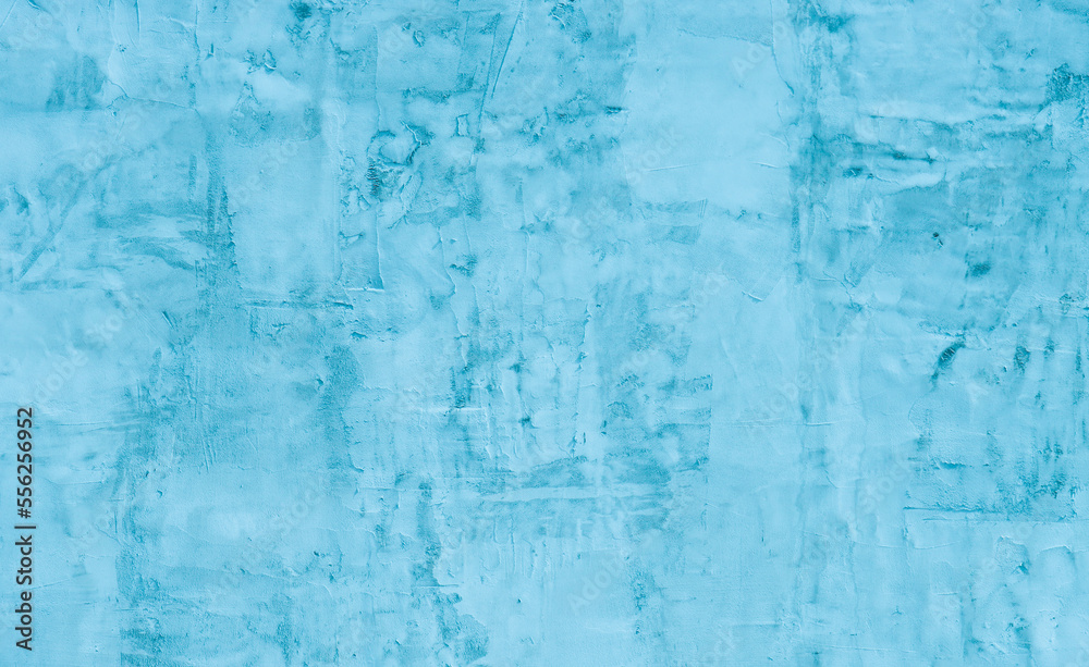 Abstract background of turquoise plaster on the wall.