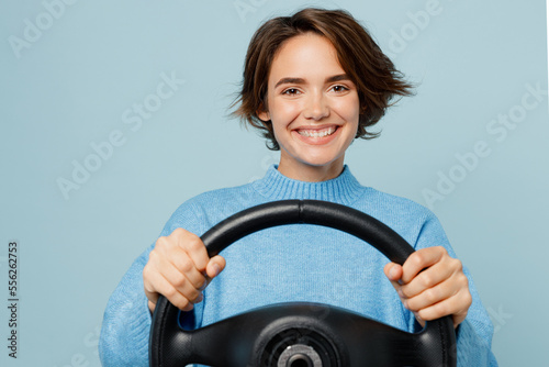 Photographie Young smiling cheerful fun caucasian woman in knitted sweater look camera hold s