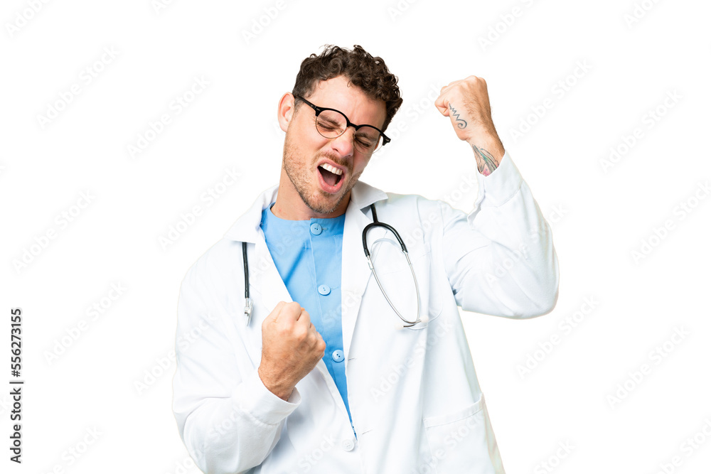 Brazilian doctor man over isolated chroma key background celebrating a victory Brazilian doctor man over isolated chroma key background celebrating a victory