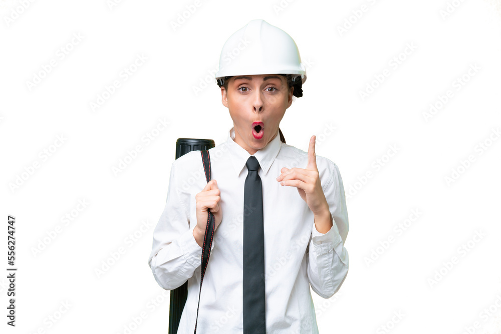 Young architect woman with helmet and holding blueprints over isolated background intending to realizes the solution while lifting a finger up Young architect woman with helmet and holding blueprints over isolated background intending to realizes the solution while lifting a finger up
