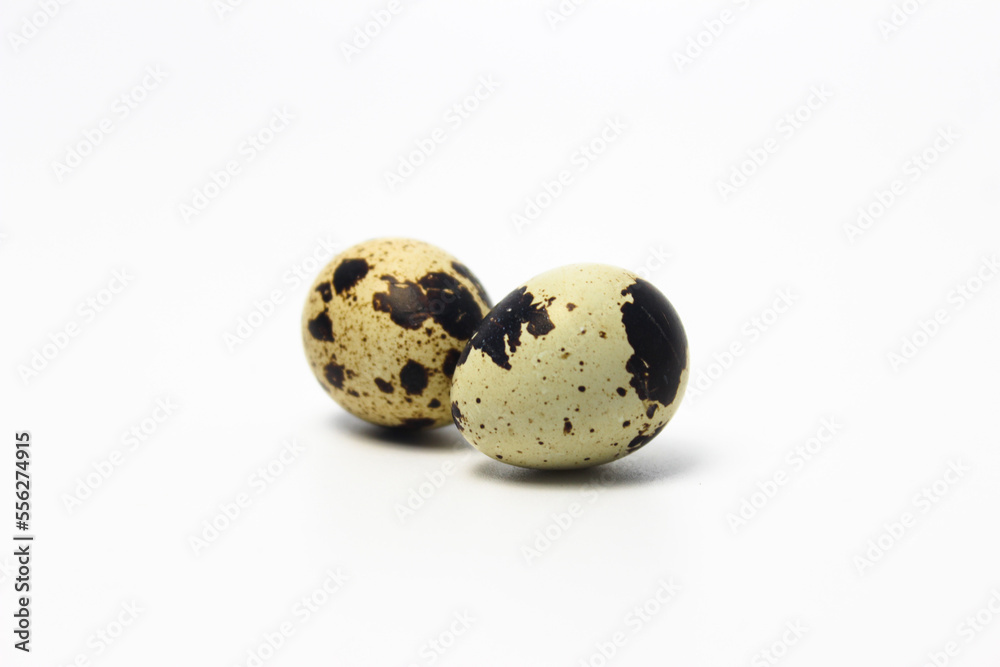 Quail Eggs Kissing Each Other, Pareidolia Effect on Quail eggs. Isolated on White Quail Eggs Kissing Each Other, Pareidolia Effect on Quail eggs. Isolated on White