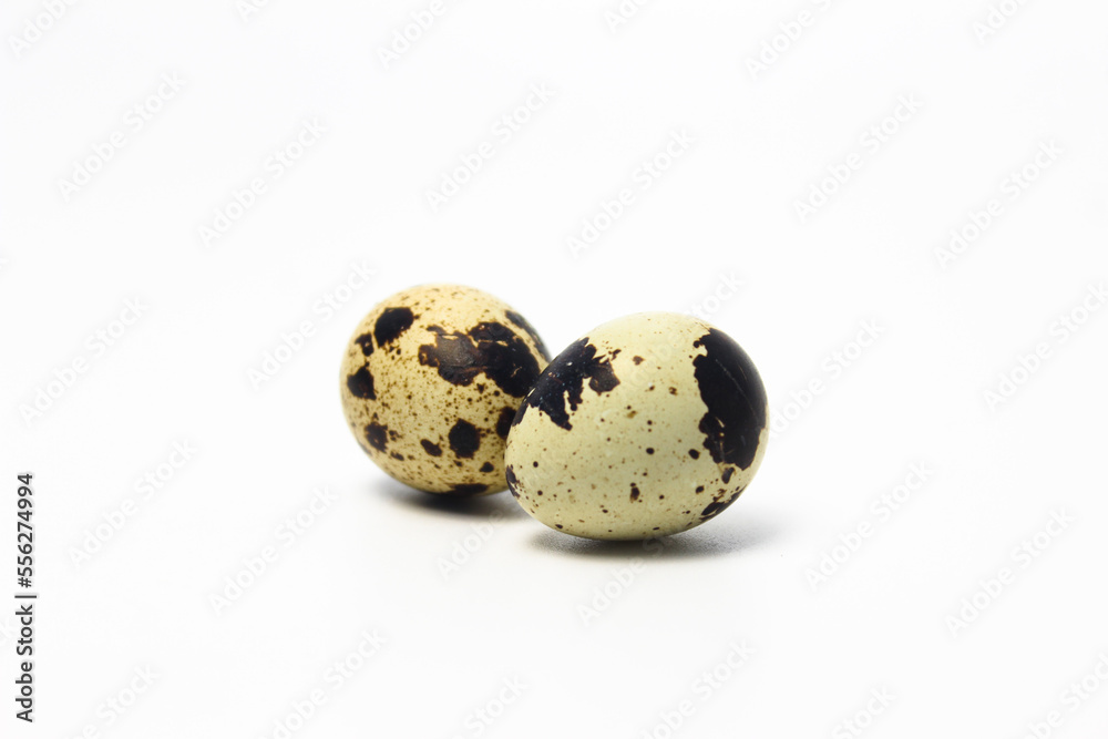 Quail Eggs Kissing Each Other, Pareidolia Effect on Quail eggs. Isolated on White Quail Eggs Kissing Each Other, Pareidolia Effect on Quail eggs. Isolated on White