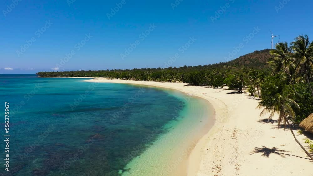 Top view of Seascape with tropical sandy beach and blue ocean. Pagudpud, Ilocos Norte Philippines Top view of Seascape with tropical sandy beach and blue ocean. Pagudpud, Ilocos Norte Philippines