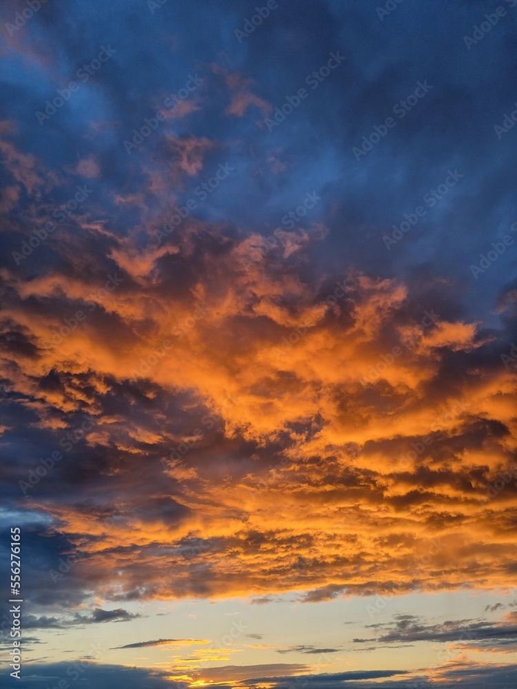 Panorama of morning sunrise with a perfect colorful sky and heavenly clouds.
