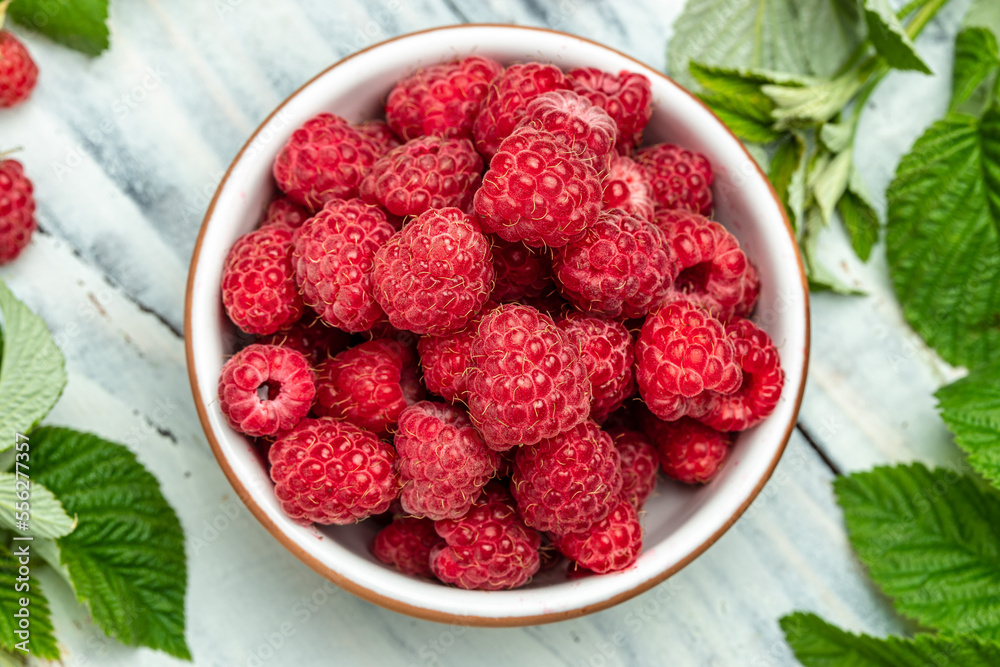 Organic raspberries, Fresh raspberries in bowl. Ripe juicy fresh raspberries. healthy food, vitamins, summer berry fruit. Long banner format. place for text Organic raspberries, Fresh raspberries in bowl. Ripe juicy fresh raspberries. healthy food, vitamins, summer berry fruit. Long banner format. place for text