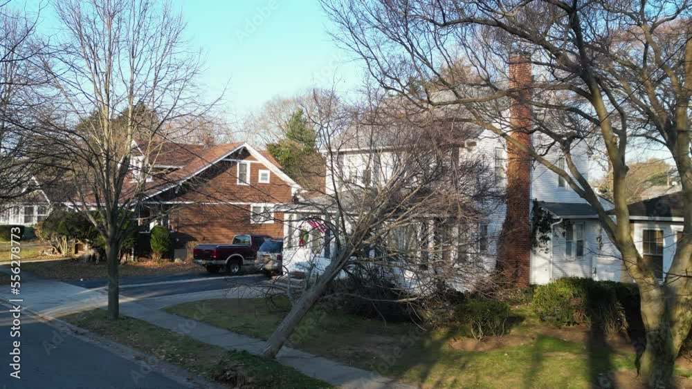 Looking down from a drone at a tree that has fallen on to a house on Christmas Eve in Babylon New York.