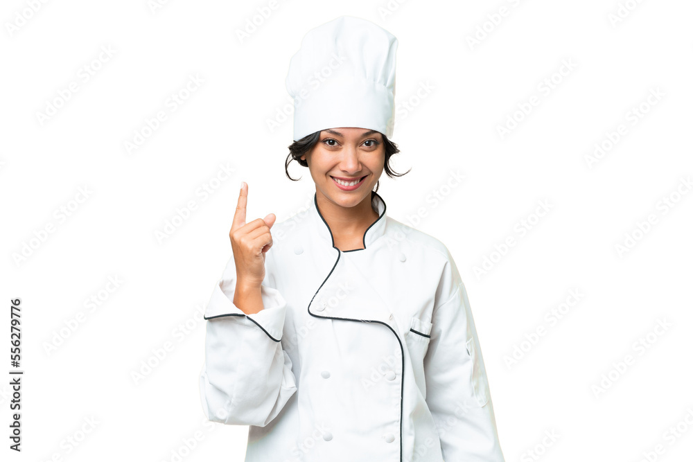 Young chef Argentinian woman over isolated background showing and lifting a finger in sign of the best