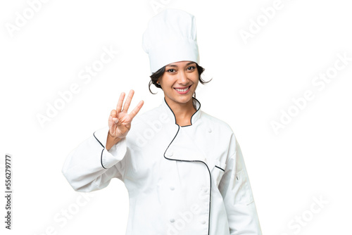 Young chef Argentinian woman over isolated background happy and counting three with fingers