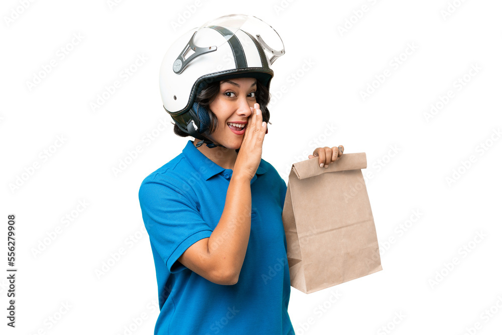 Young Argentinian woman taking a bag of takeaway food over isolated background whispering something Young Argentinian woman taking a bag of takeaway food over isolated background whispering something