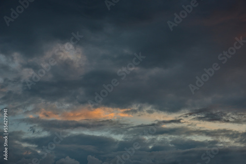 Russia. Eastern Siberia. Dramatic clouds in the evening sky over the Sayan Mountains.