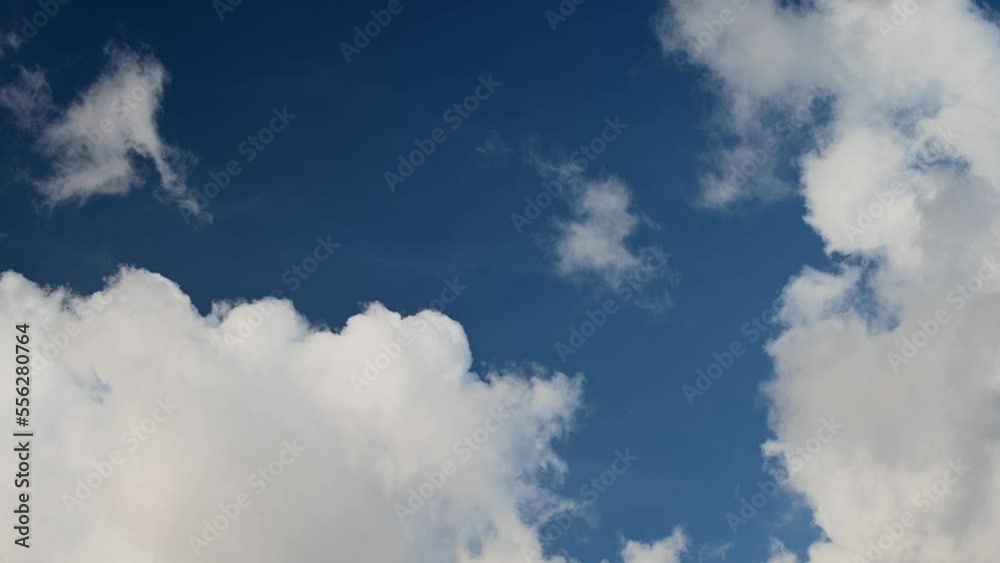 Air clouds in the blue sky, blue background in the air, blue sky with white clouds Abstract backdrop for movies, animation. Air clouds in the blue sky, blue background in the air, blue sky with white clouds Abstract backdrop for movies, animation.