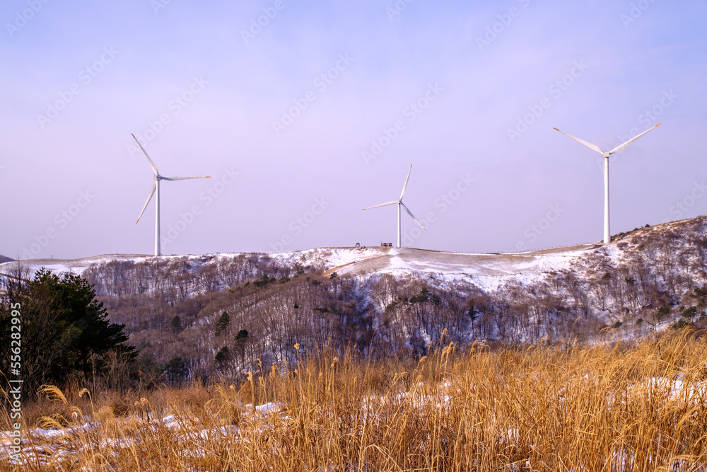 Scenic view of wind power against sky Scenic view of wind power against sky