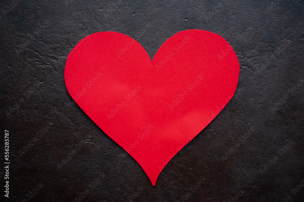 valentines day arrangement heart shaped piece of red card on black background as a gift to show love and affection for a specific person who they adore during the yearly special day
valentines day arrangement heart shaped piece of red card on black background as a gift to show love and affection for a specific person who they adore during the yearly special day