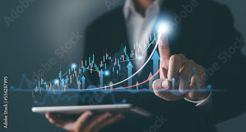 Obraz na płótnie Stock market trading. Business man discussing and analysis graph stock.stock chart concept. Investment stock market. w salonie