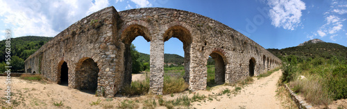 Panoramic view of a roman aqueduct passing Agly river near the village of Ansignan, Occitanie region in France