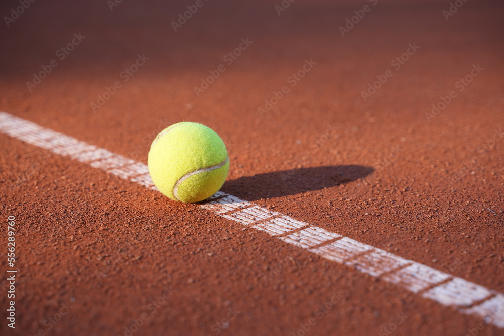 tennis ball on the clay court outdoor sport activity