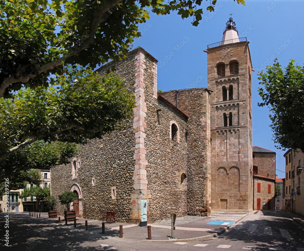 Romanesque church of St Pierre with its ancient bell tower in the old town of Prades, Pyrénées-Orientales in France