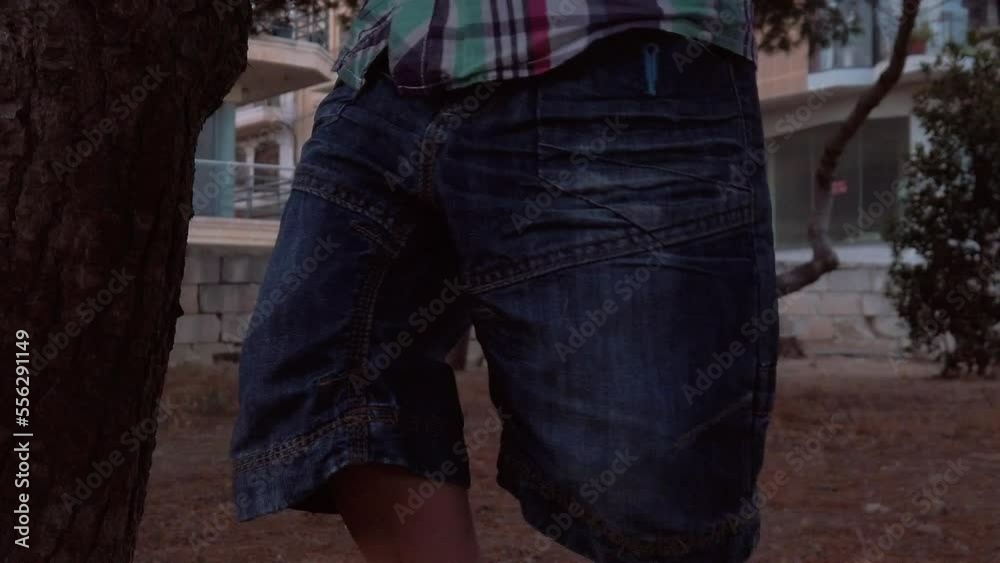 Toddler in the park. Close up on his feet revealing his confused facial expression. slow motion. High quality FullHD footage Toddler in the park. Close up on his feet revealing his confused facial expression. slow motion. High quality FullHD footage