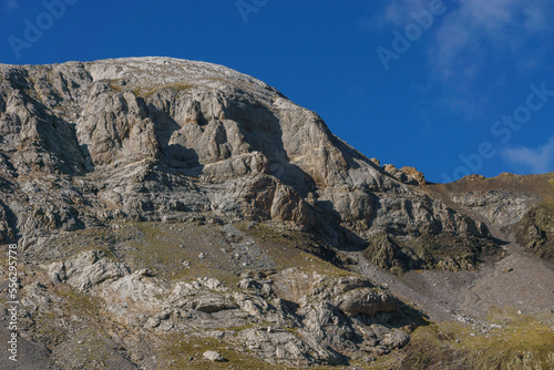 Beautiful detail of a rocky mountain at the Pyrenees on a sunny autumn day at the french and spanish border, Huesca, Spain