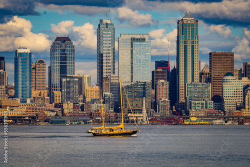 Yellow boat on the background of skyscrapers. Seattle downtown, view From Don Armeni Boat Ramp © khomlyak