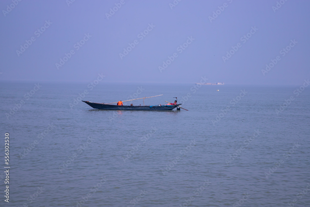 Landscape View of a fishing boat on the  Padma river in Bangladesh