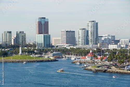 The view of the boat harbor and buildings in the city along Queensway Bay near Long Beach, California, U.S.A photo