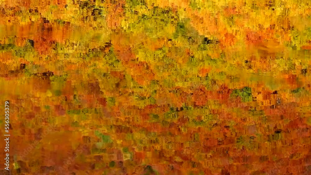 Autumn forest with a reflection on the restless surface of the lake Autumn forest with a reflection on the restless surface of the lake
