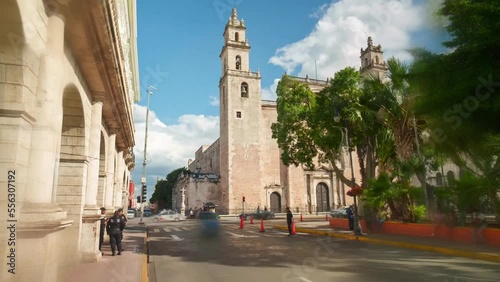 Merida, Yucatan, Mexico motion hyperlapse or timelapse of the Cathedral Ildefonso, at 4K Time Lapse showing traffic and people moving.