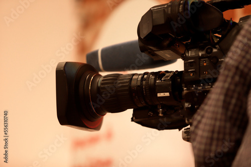 TV camera with microphone on set