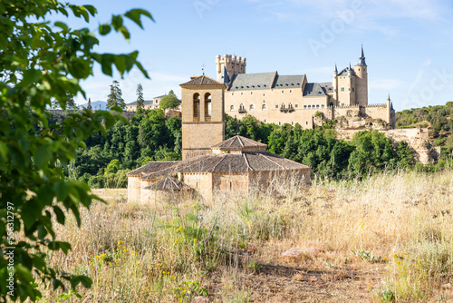 Church of the Vera Cruz (True Cross) with the Alcazar of Segovia in the background, Castile and Leon, Spain photo