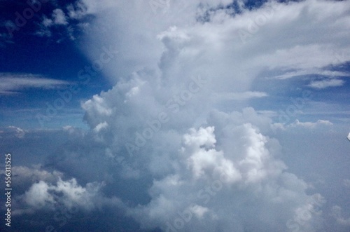 In-Between Cloud Layers - Two Cloud Layers Connecting in a Tornado-Like (or Twister-Like) Way - View From a Plane © Aleksei