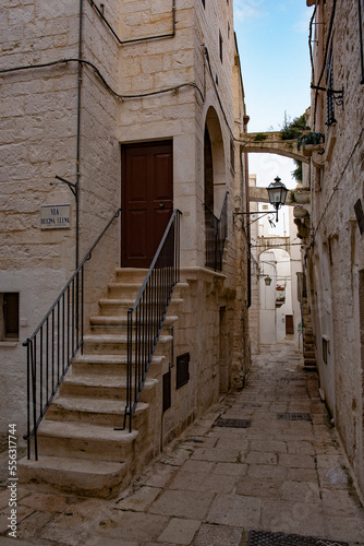 Puglia, Murge, white stone houses, alleys, basoli old town in a summer day.