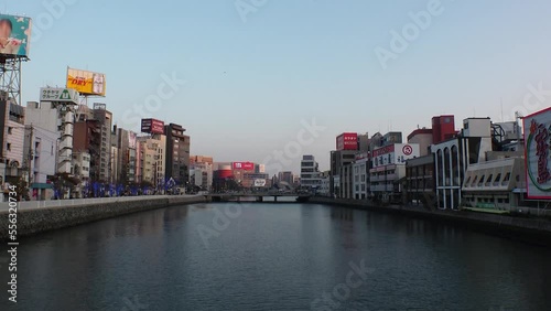 Wallpaper Mural NAKASU, HAKATA, FUKUOKA, JAPAN - NOV 2022 : View of NAKASU area in sunset. Red-light district which exists between the sandbank of the Naka River and the Hakata River. Time lapse shot, dusk to night. Torontodigital.ca