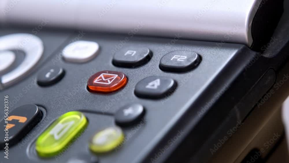 Phone console with new message notification and envelope icon, concepts for sending newsletters, receiving calls and messages. Phone console with new message notification and envelope icon, concepts for sending newsletters, receiving calls and messages.