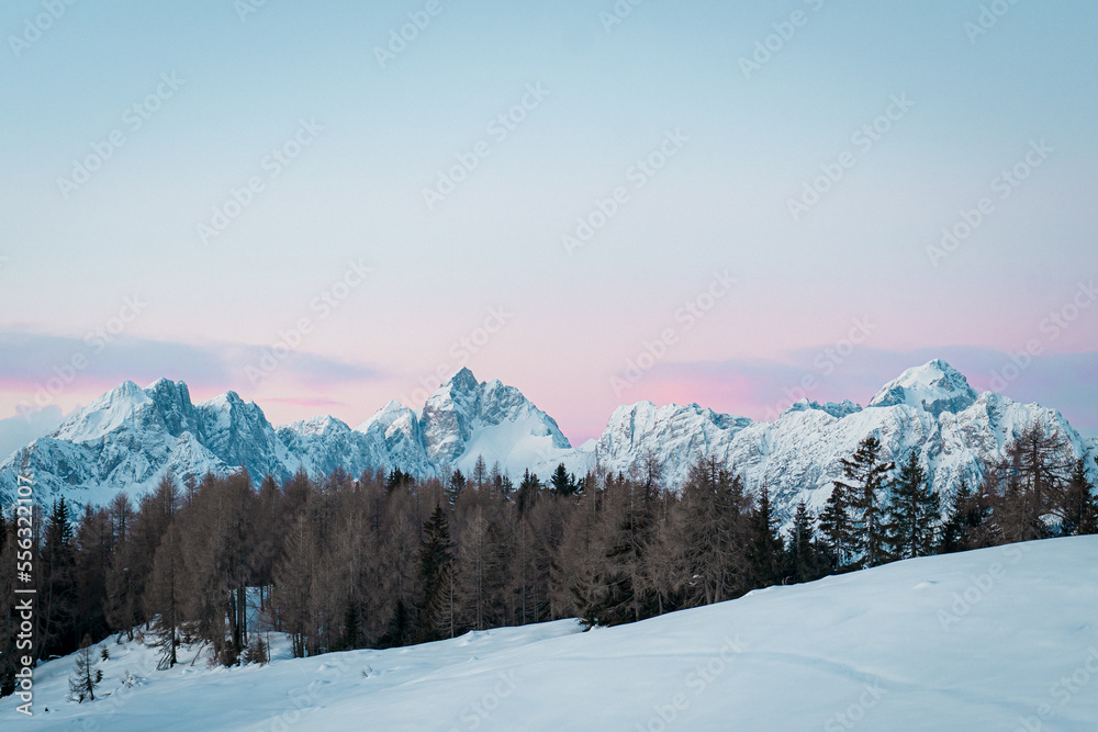 winter mountain landscape on sunset