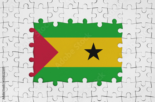 Sao Tome and Principe flag in frame of white puzzle pieces with missing central parts photo