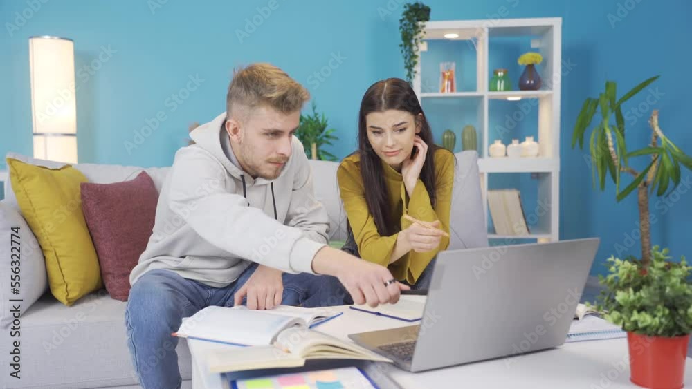 Student girl and boy study at home.
Two friends study at home. University students study.
Student girl and boy study at home.
Two friends study at home. University students study.