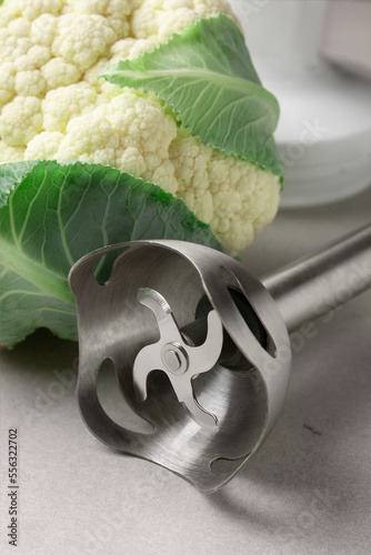 blender with fruits and vegetables on background

 photo