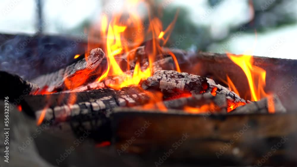 the fire burns bright and provides warmth and heat for cooking the fire burns bright and provides warmth and heat for cooking