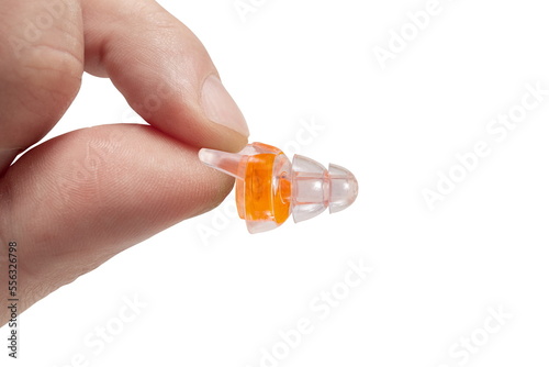 Silicone ear plugs for human ears on white background