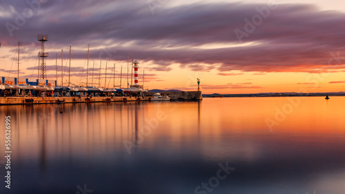 sunset over the harbor © Vasil
