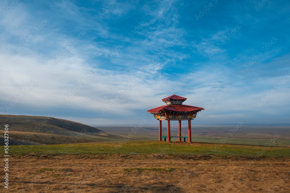 Beautiful Buddhist gate in the endless steppe Beautiful Buddhist gate in the endless steppe