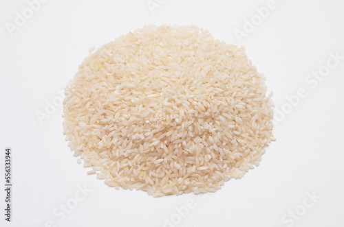 heap of white rice isolated on white background