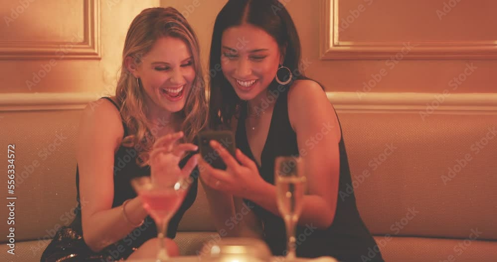 Party, friends and women with phone in nightclub typing message on social media, networking and online dating app. Celebration, social event and girls using smartphone at rave, disco and cocktail bar