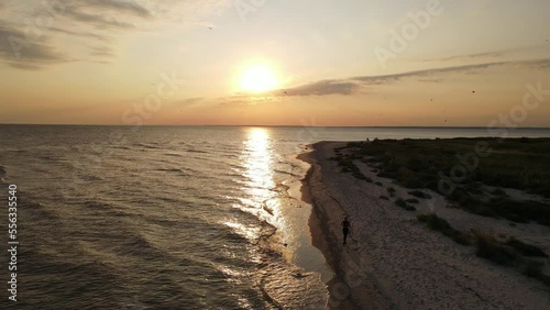 Wallpaper Mural Girl run on the beach at sunset time, drone footage, fitness Torontodigital.ca