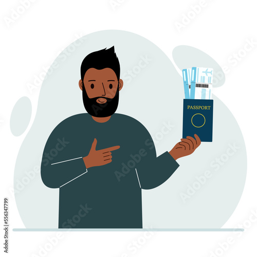 A man holds a passport with air tickets. The man shows the boarding pass. Travel concept.