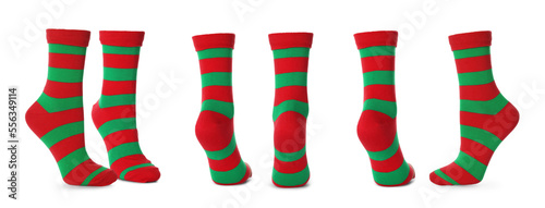 Pairs of bright striped socks on white background, collage. Banner design