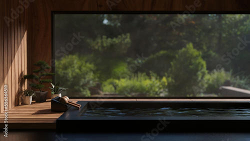 Beautiful and luxury Onsen room in Japanese style with bath against the window with nature view. © bongkarn