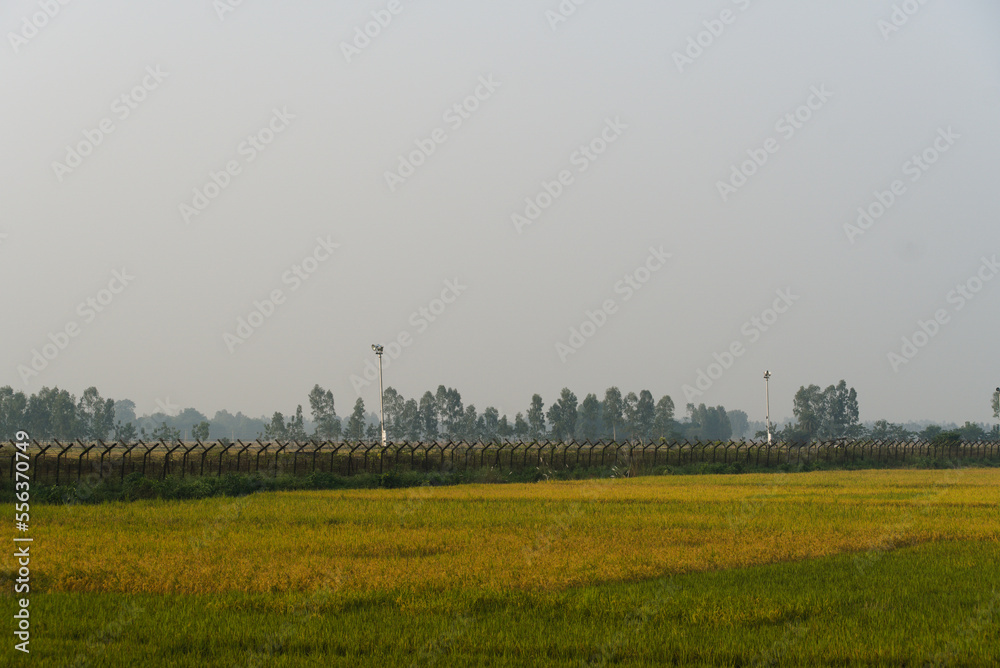 13.11.2022, Radhikapur, West Bengal, India.International Border fence between India and Bangladesh country situated in Radhikapur India
