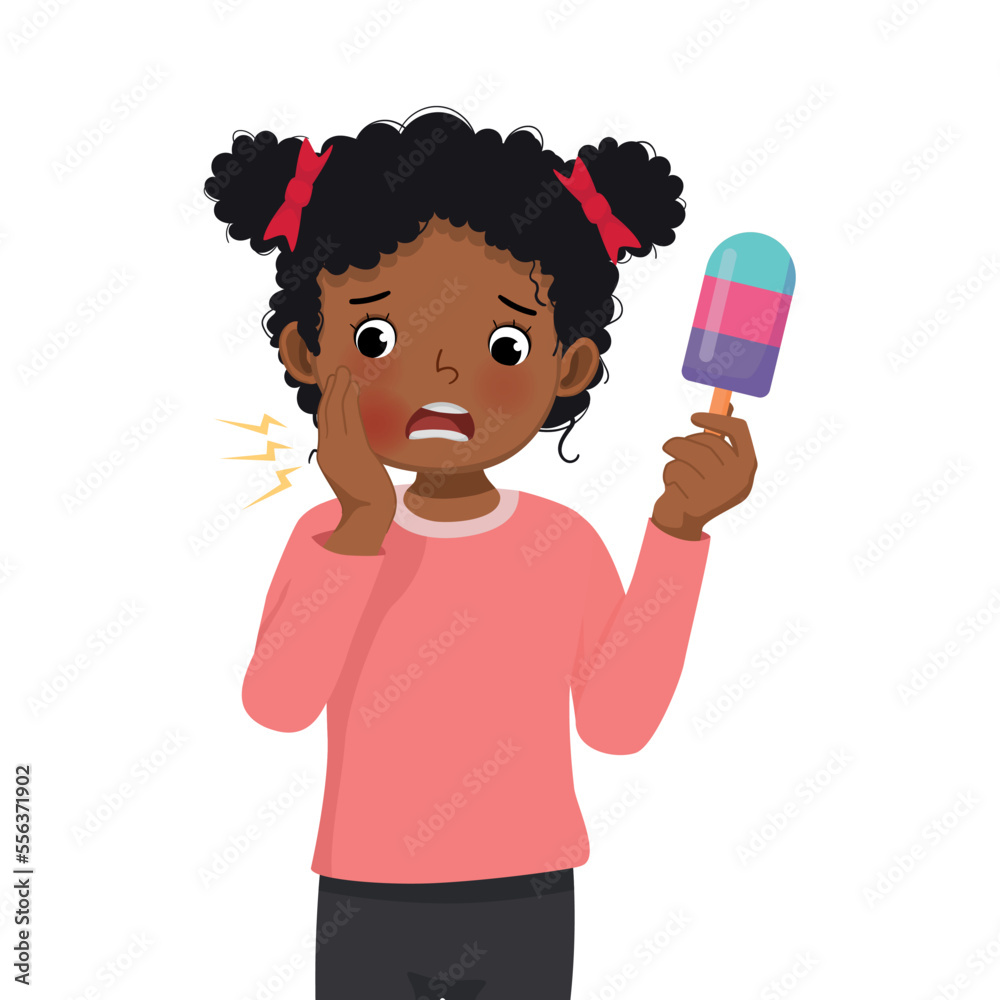Cute little African girl with sensitive teeth having toothache while eating cold ice cream touching her cheek feel painful Cute little African girl with sensitive teeth having toothache while eating cold ice cream touching her cheek feel painful